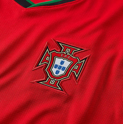 Stussy Portugal Edition Jersey featuring vibrant red and green colors, Stussy branding, and the Portugal national crest, celebrating the fusion of streetwear and football.